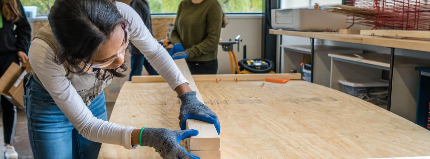 photo of student working in a wood shop